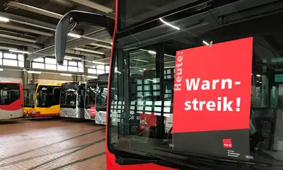 Plakat von ver.di in der Frontscheibe eines Busses zu einem Warnstreik
